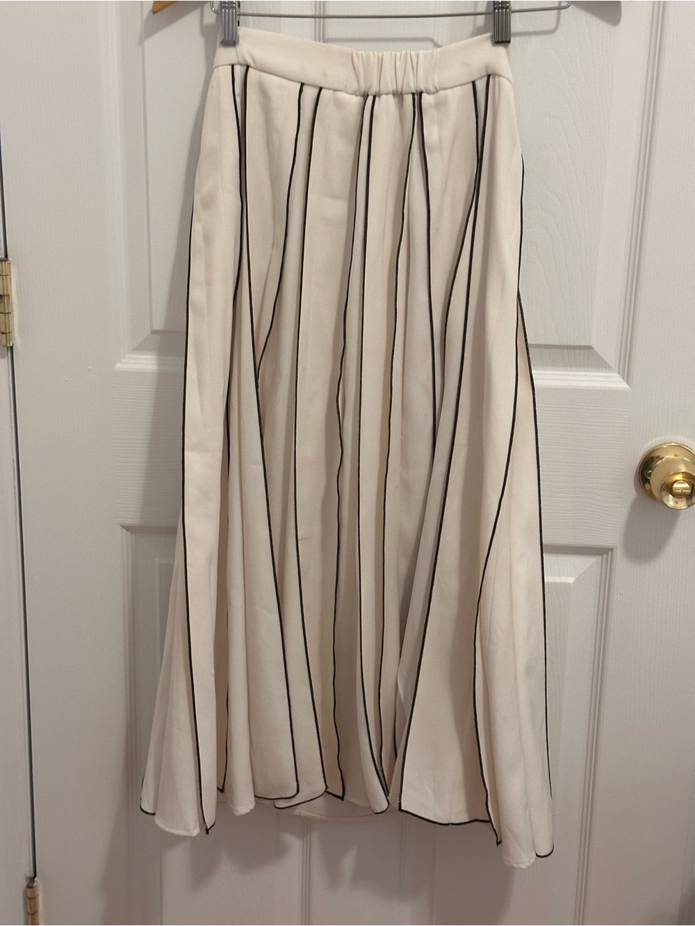 Elegant Cream Midi Skirt with Black Pinstripes